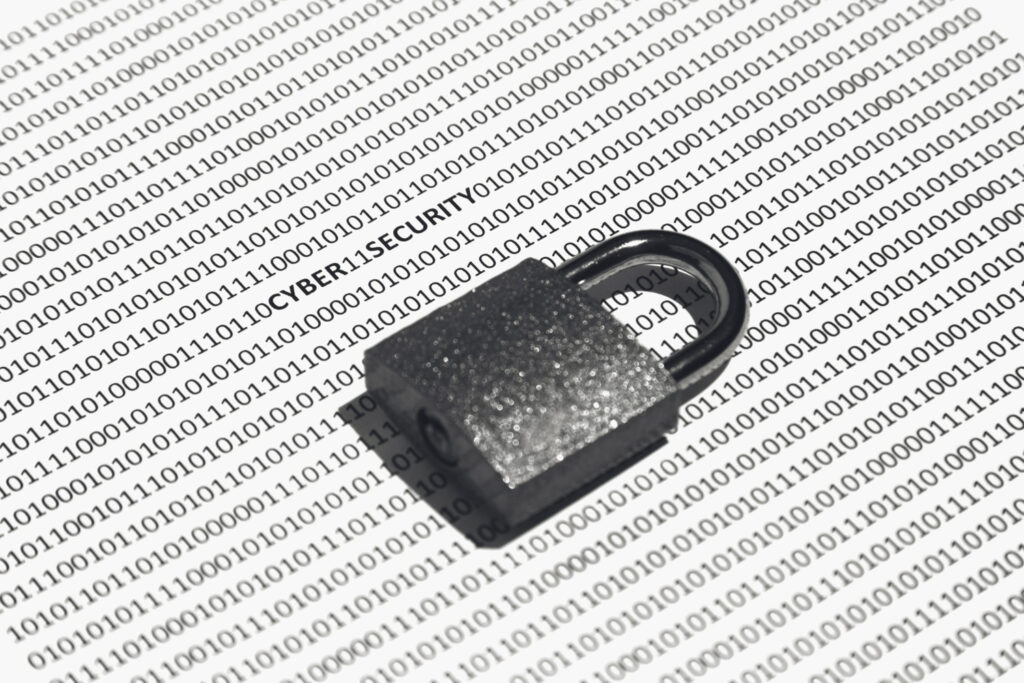 closeup-shot-of-a-lock-on-a-white-surface-with-binary-code-on-it-concept-of-cybersecurity