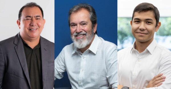 Montagem com três retratos lado a lado. À esquerda, homem de cabelos curtos e escuros, pele clara, vestindo blazer cinza escuro sobre camisa preta, sorrindo. No centro, homem de cabelos grisalhos e barba branca, usando camisa social branca, sorrindo diante de um fundo azul. À direita, jovem de cabelos curtos e castanhos, pele clara, vestindo camisa branca, sorrindo levemente com os braços cruzados diante de um fundo desfocado com vegetação. (unicórnio) (startup)