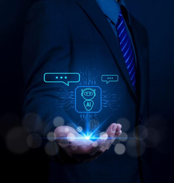 Homem de terno com tecnologia de Agente de Inteligência Artificial (IA agêntica) sobre as mãos, representando inovação digital