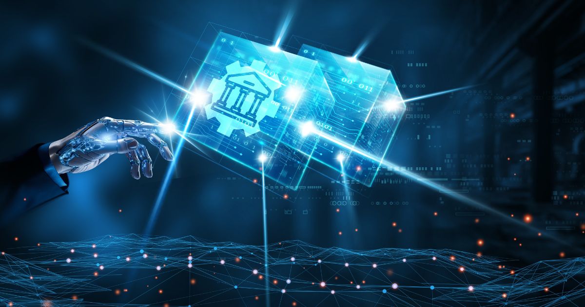 A imagem mostra uma mão robótica estendida em direção a dois cubos holográficos flutuantes. Um dos cubos exibe o ícone de um edifício bancário, enquanto o outro contém diversos símbolos digitais e dados. O fundo apresenta um cenário escuro e futurista, com linhas e nós interconectados, sugerindo uma paisagem digital ou de rede. (IA)