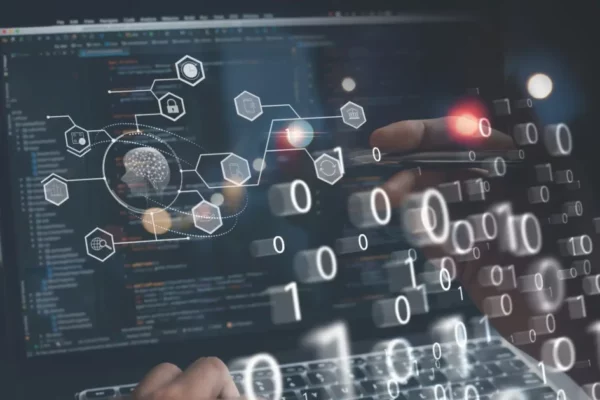Imagem de uma pessoa interagindo com uma tela digital mostrando elementos de tecnologia, códigos e conceitos de inteligência artificial e segurança cibernética. (risco)